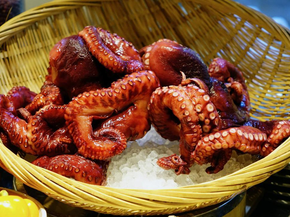 Free Image of Basket Filled With Cut-Up Octopus 