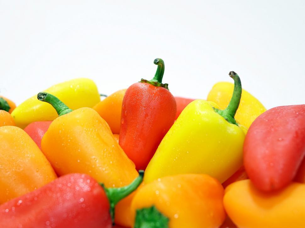 Free Image of Pile of Red, Yellow, and Green Peppers 