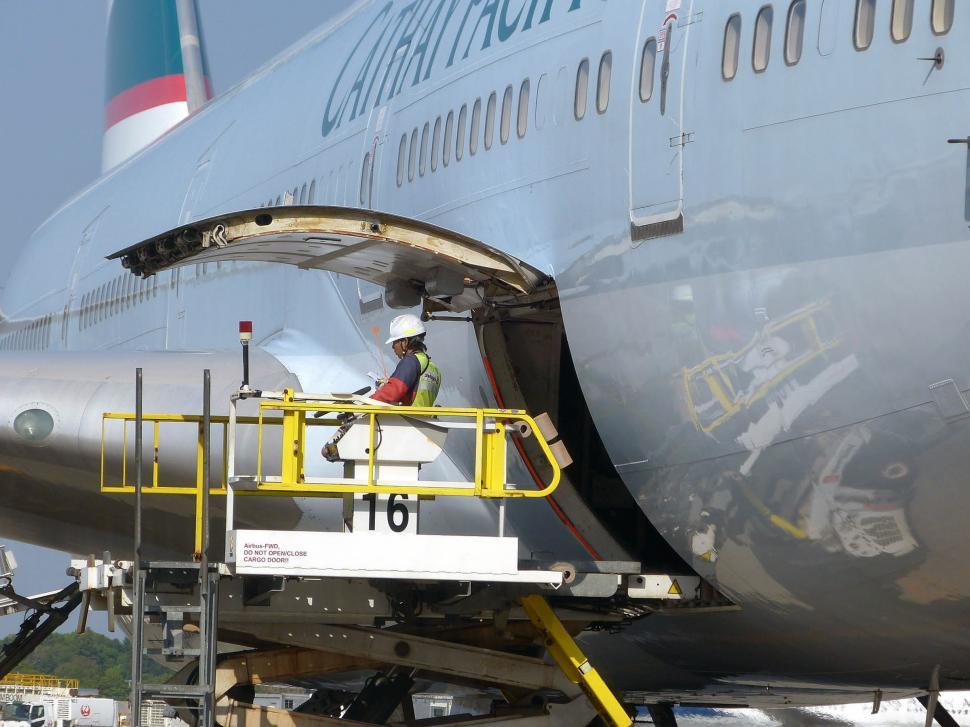 Free Image of Large Jetliner Parked on Airport Tarmac 