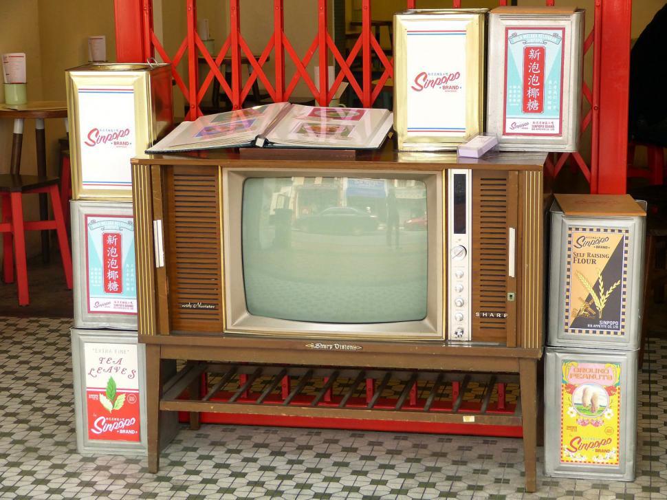 Free Image of Vintage TV on Wooden Stand 