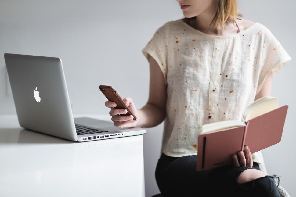 Free Image of Woman Multitasking 