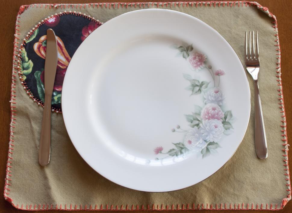 Free Image of White Plate With Floral Design 