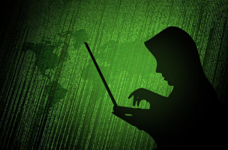 Download Free Stock Photo of Hacker - Silhouette Set Against Binary Coded World Map 