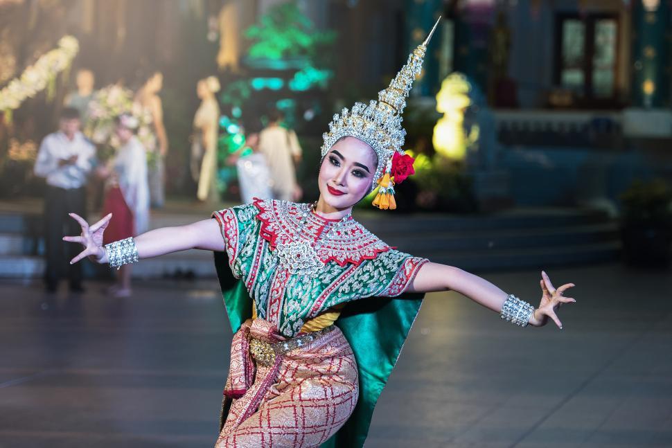 Free Image of Woman in Costume Dancing on Stage 