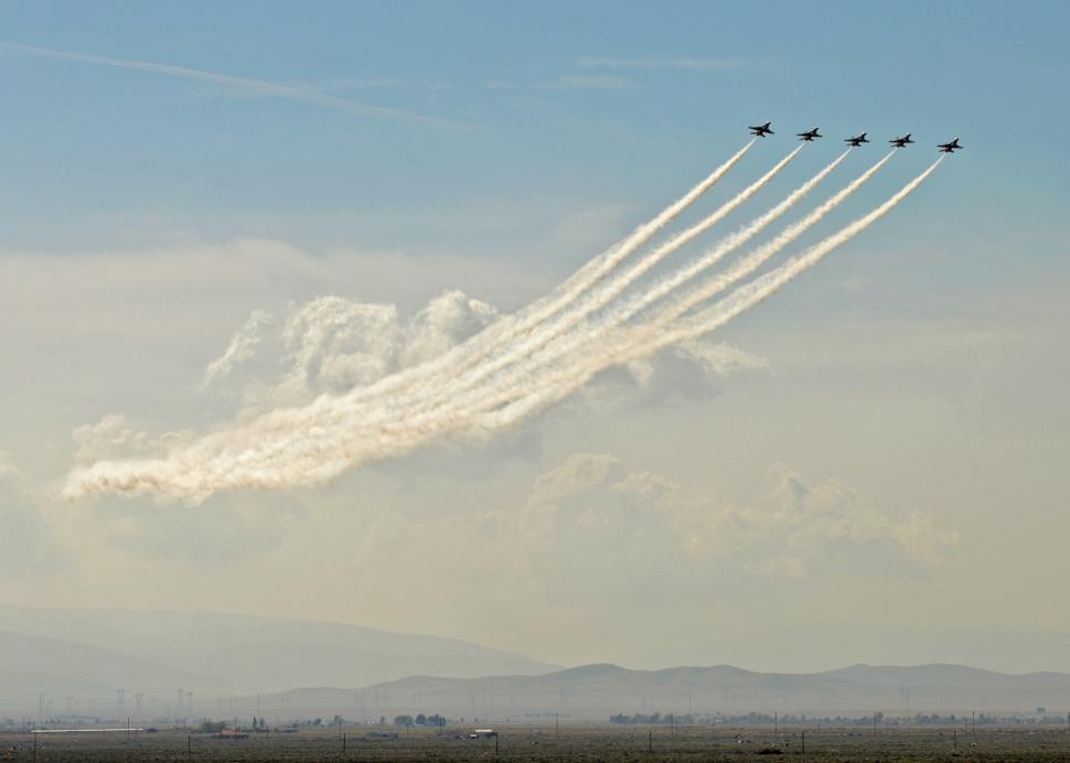Free Image of Group of Airplanes in Formation Flying in the Sky 