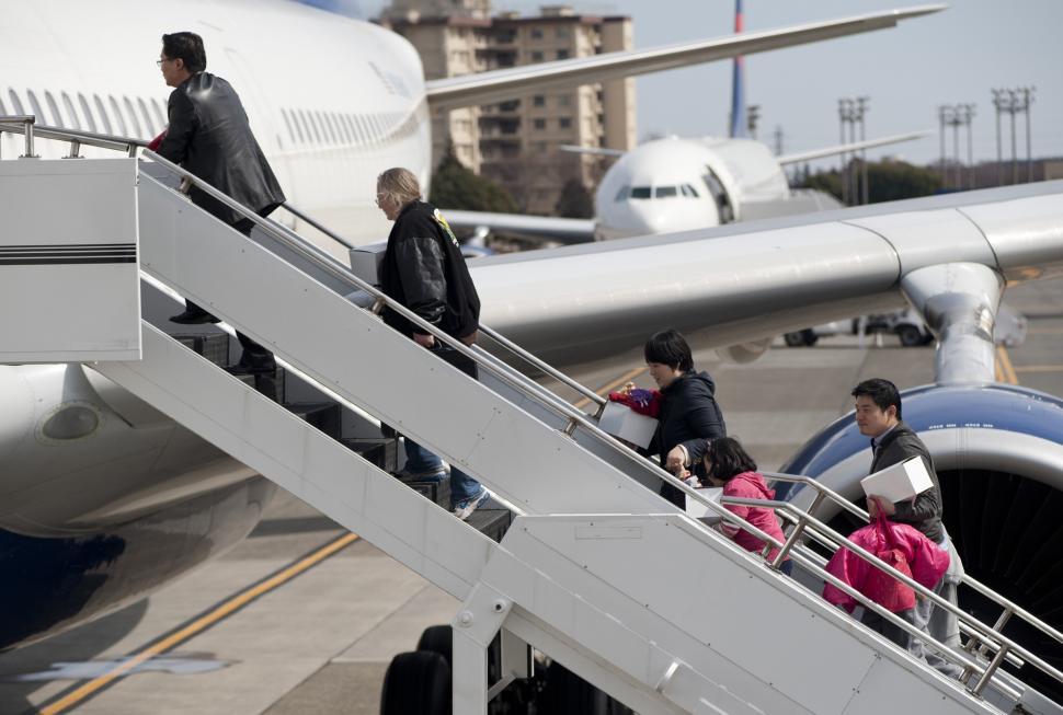 Free Image of Group Boarding Airplane at Airport 