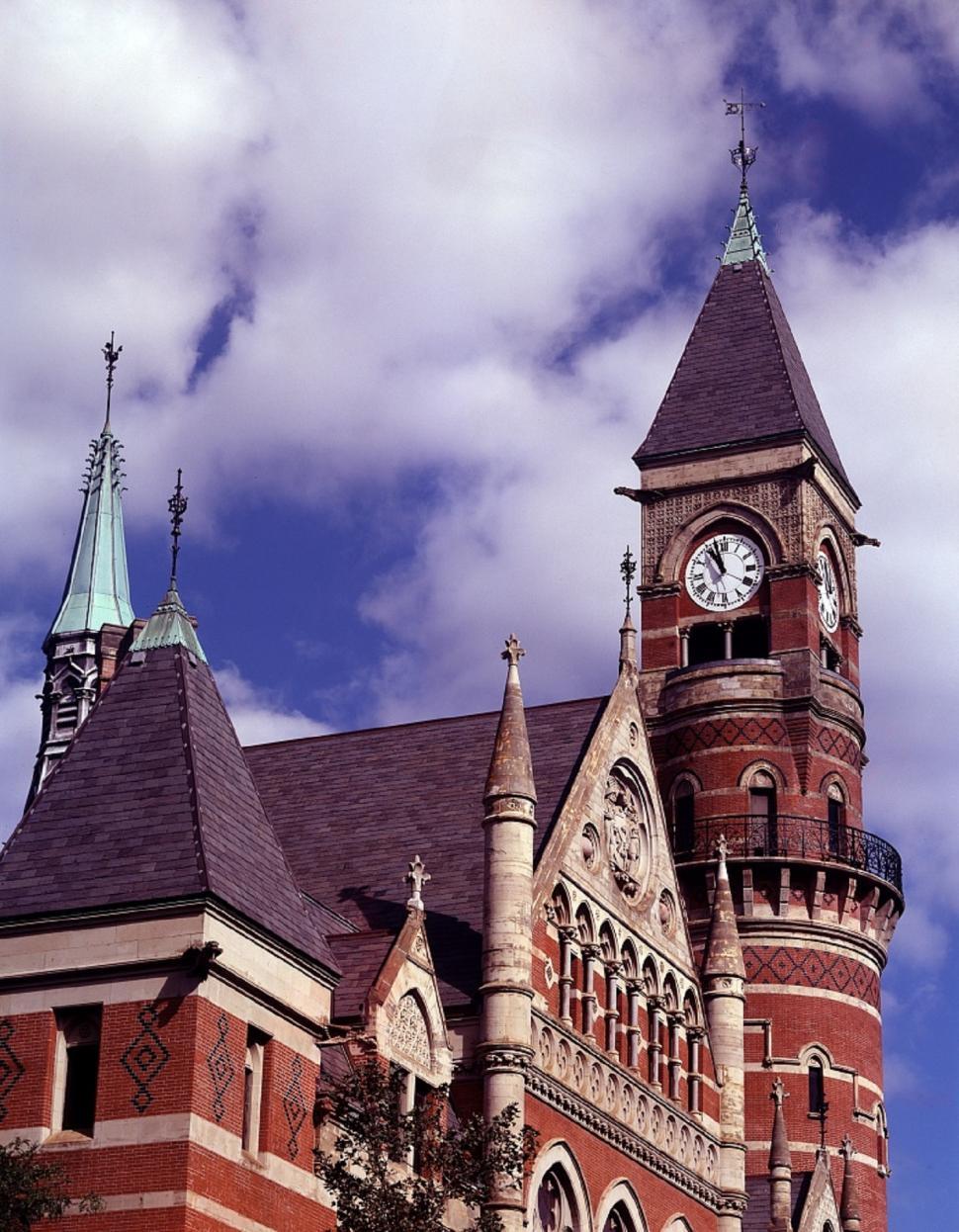 Free Image of Historic Brick Building With Clock Tower 