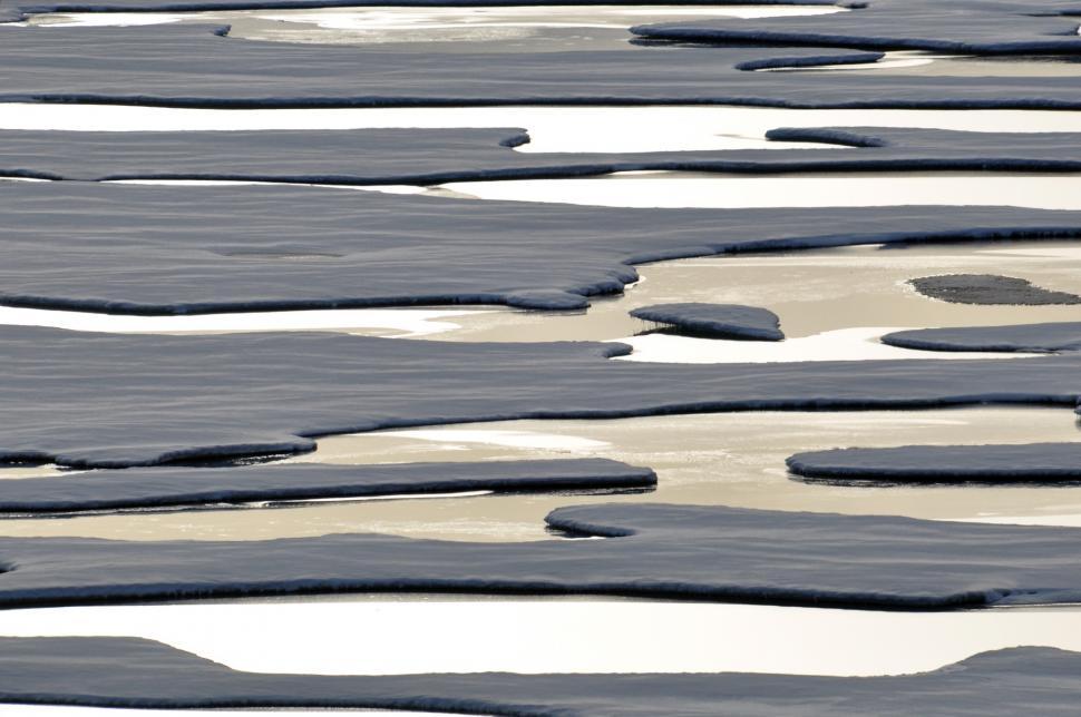 Free Image of Group of Ice Floes Floating on Water 