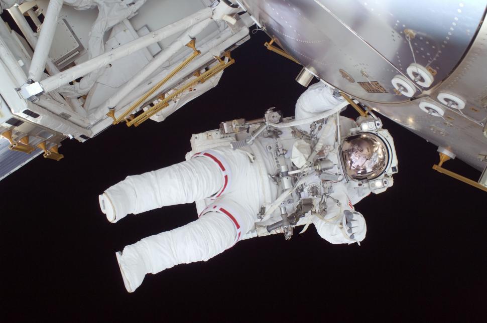Free Image of Astronaut Floating Outside Space Station 