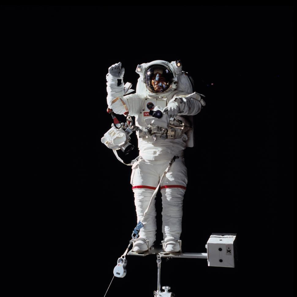 Free Image of Astronaut in Spacesuit Standing on Platform 