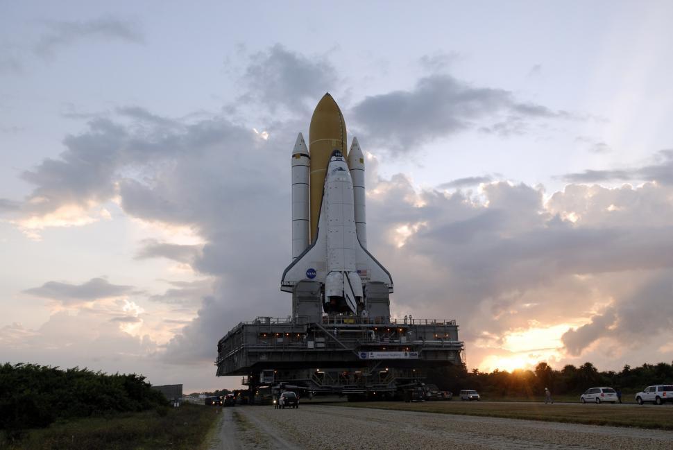 Free Image of Large Rocket on Top of Dirt Road 