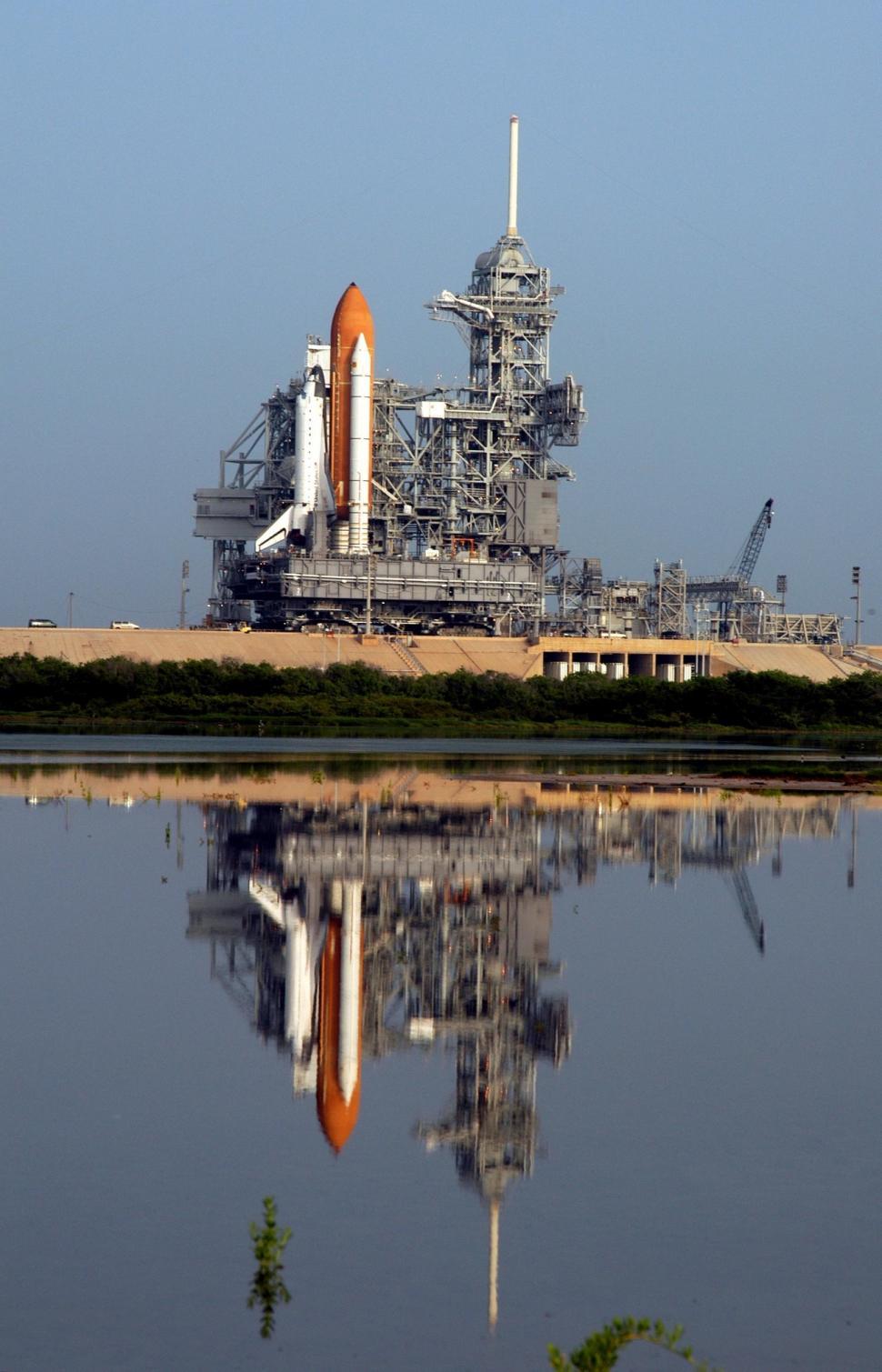 Free Image of Reflection of a Space Shuttle on a Body of Water 
