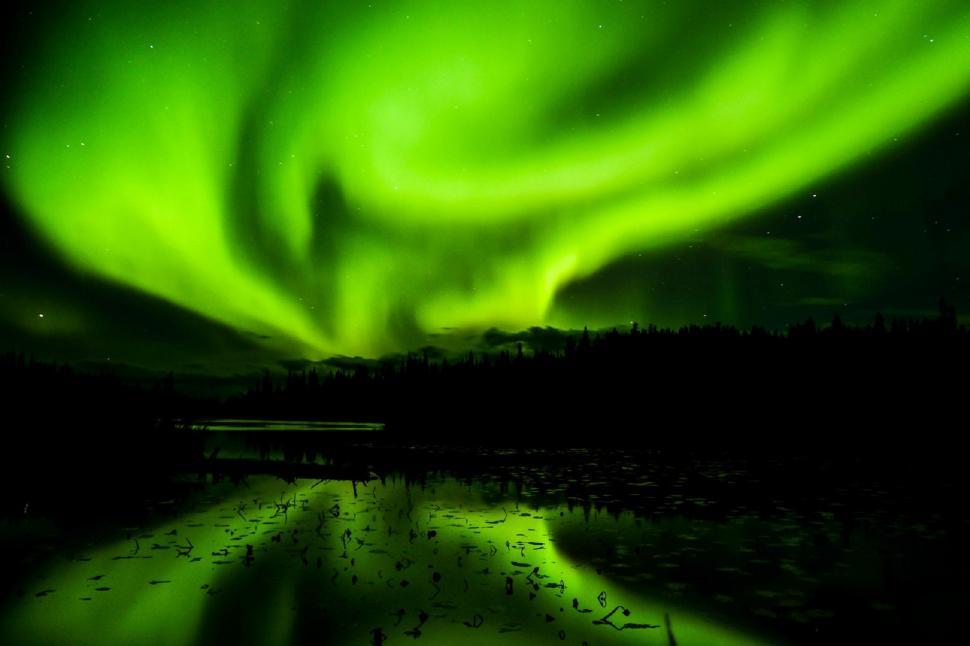 Free Image of Aurora Over a Body of Water 