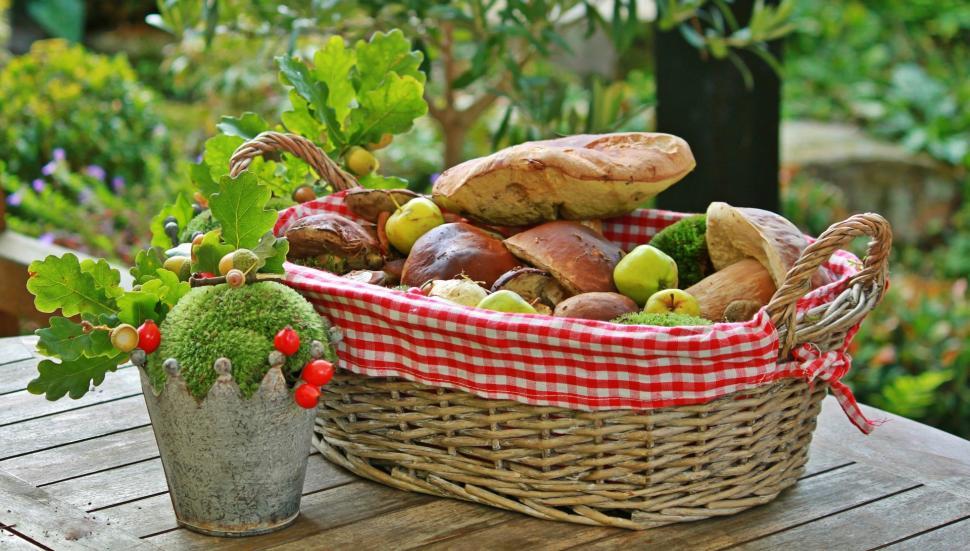 Free Image of A Basket of Food on a Wooden Table 