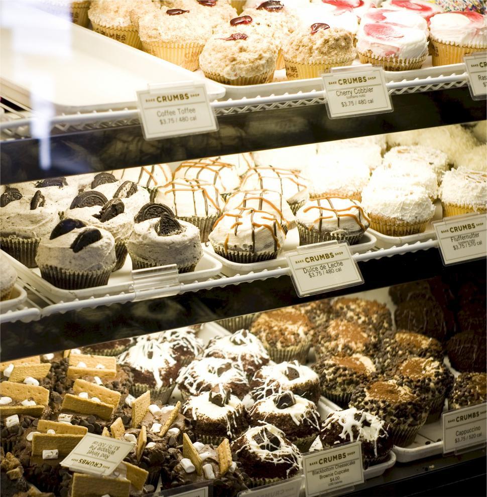 Free Image of Display Case Filled With Various Types of Cakes 