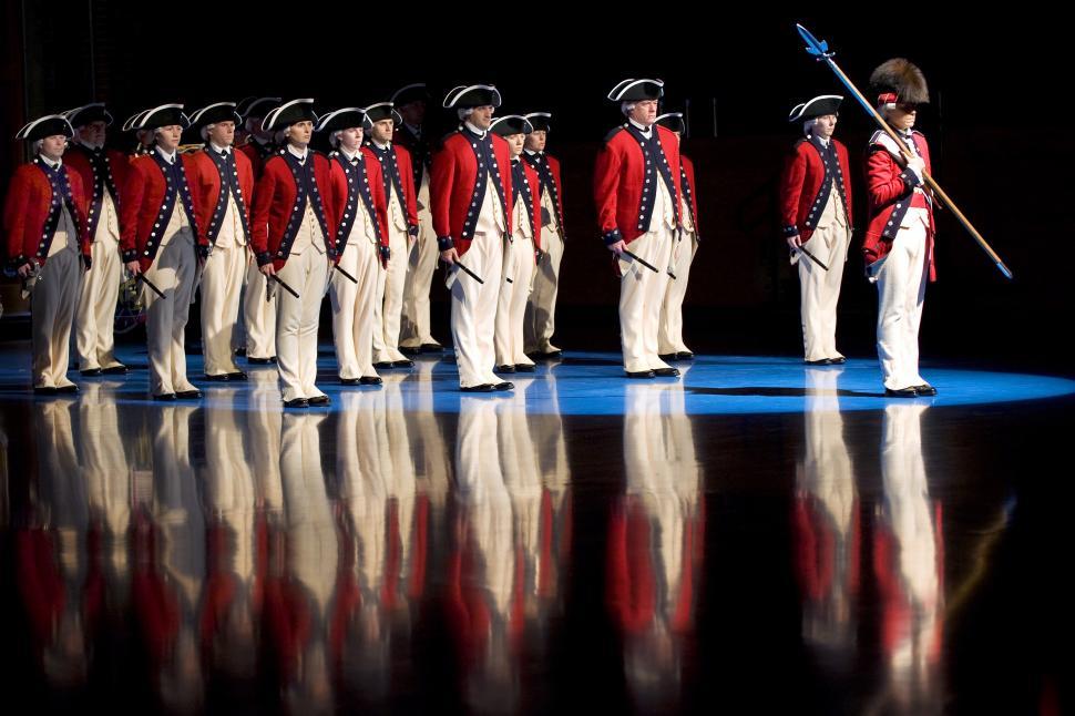 Free Image of Group of Men in Red and White Uniforms 