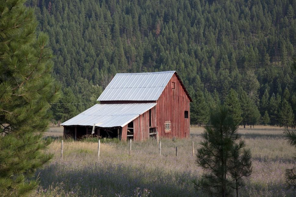 Free Image of Red Barn in the Middle of a Field 