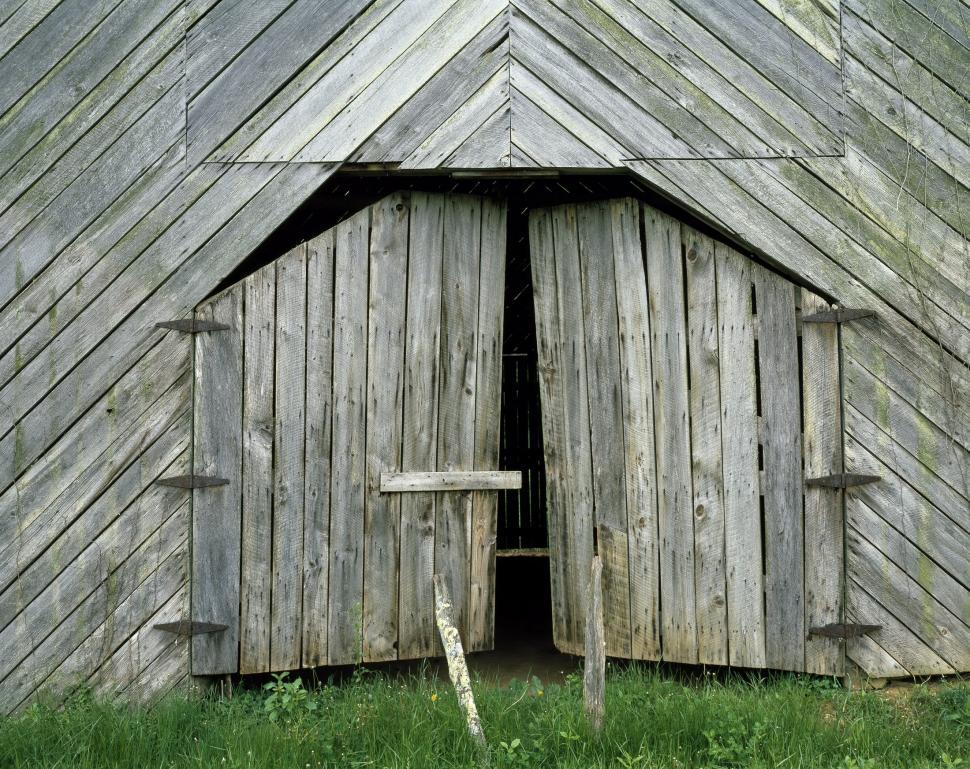 Free Image of Barn With Wooden Door in Grass 
