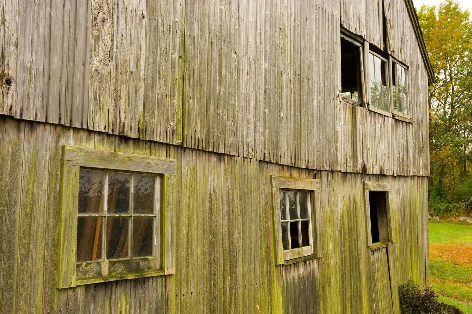 Free Image of Old Wooden Barn With Windows and Grass 