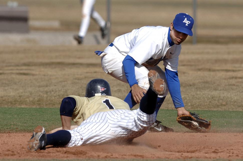 Free Image of Baseball Player Sliding Into Base During Game 