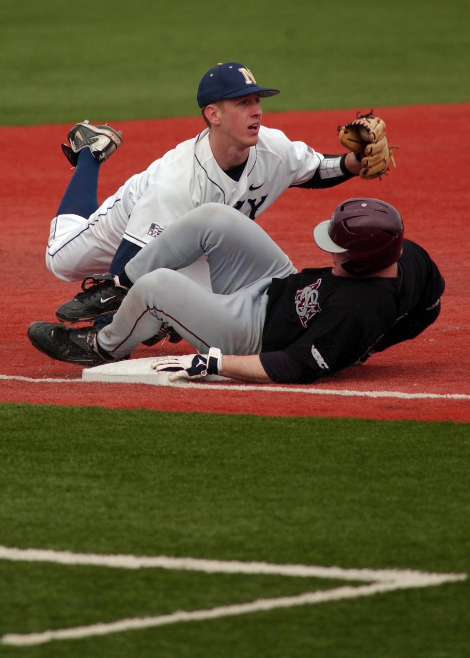 Free Image of Baseball Player Sliding Into Base on Field 