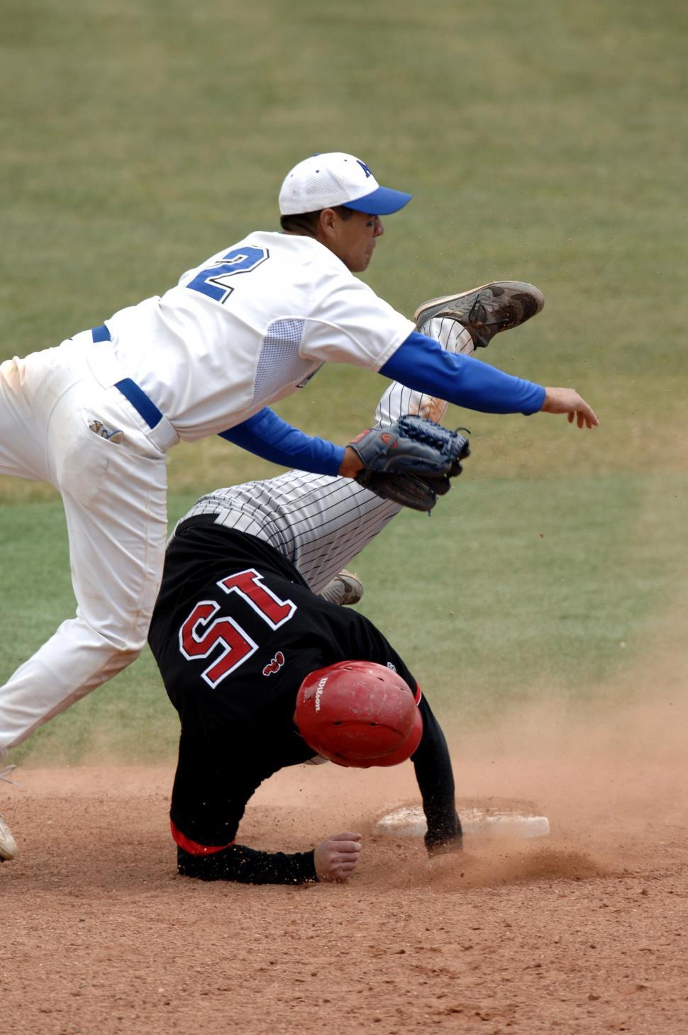 Free Image of Baseball Player Sliding Into Base During Game 