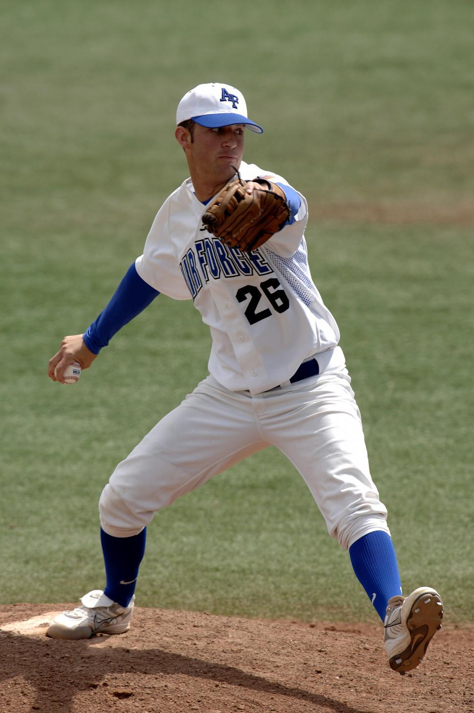 Free Image of Baseball Player Throwing Ball on Field 