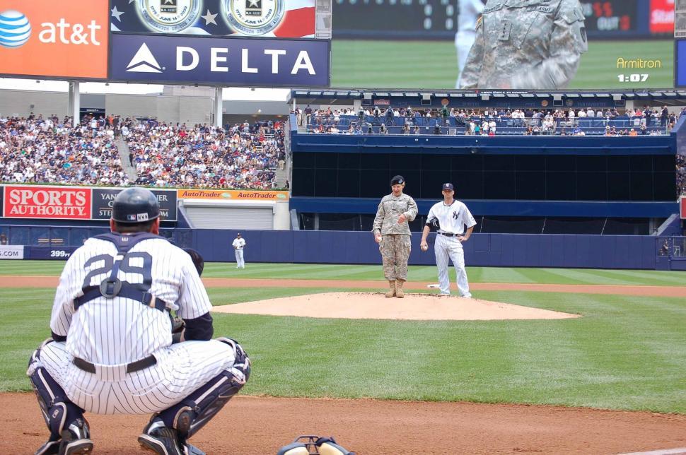 Free Image of Baseball Player Kneeling on Field During Game 