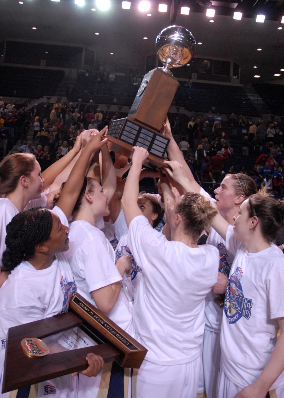 Free Image of Womens Basketball Team Holding Trophy 