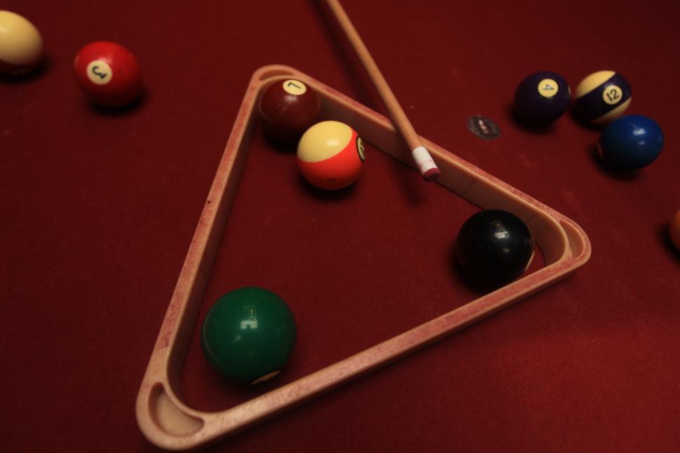 Free Image of Pool Table With Pool Balls and Racket 