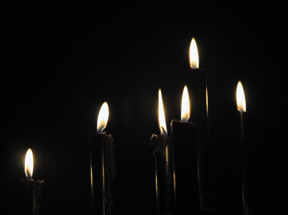 Free Image of Row of Lit Candles in the Dark 