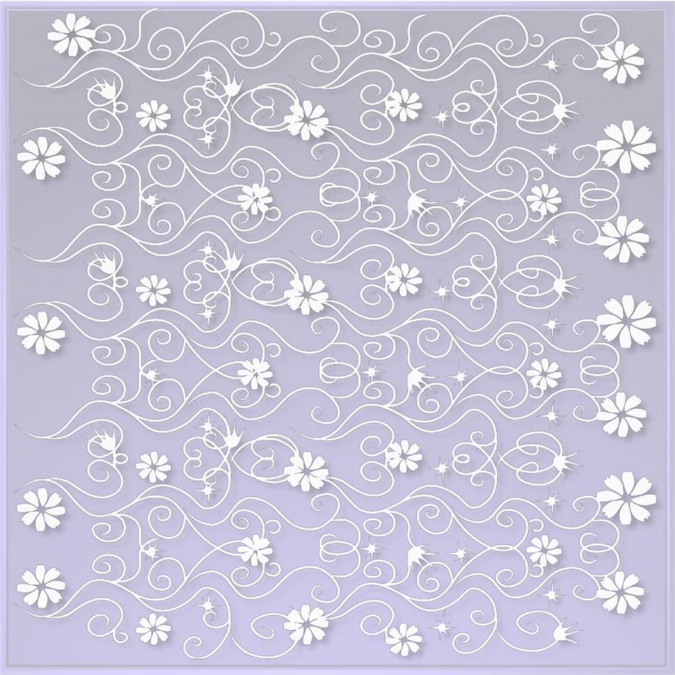 Free Image of Intricate Paper Cut Out of Flowers and Swirls 