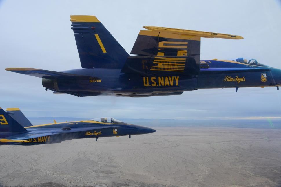 Free Image of Two Navy Jets Flying Side by Side 