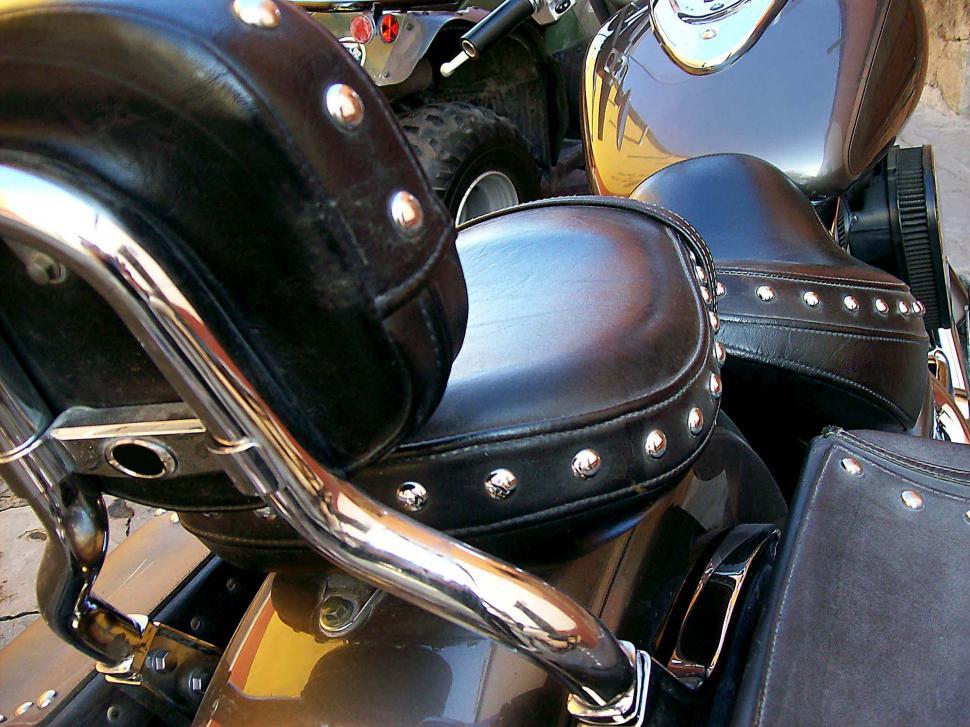 Free Image of Close Up of Parked Motorcycle on City Street 