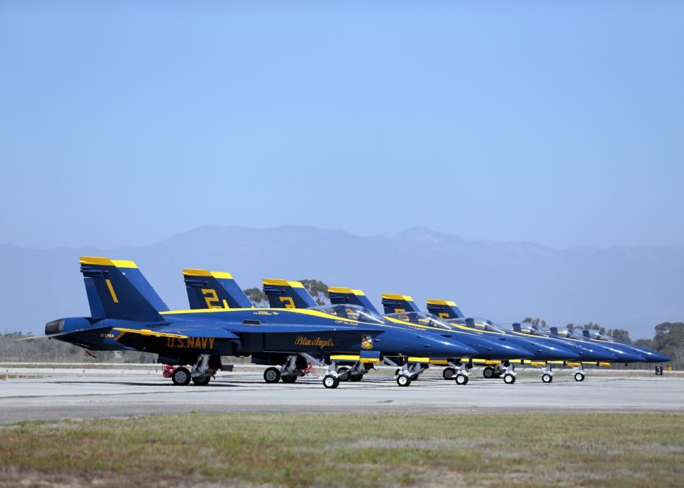 Free Image of Fighter Jets Lined Up on Airport Tarmac 