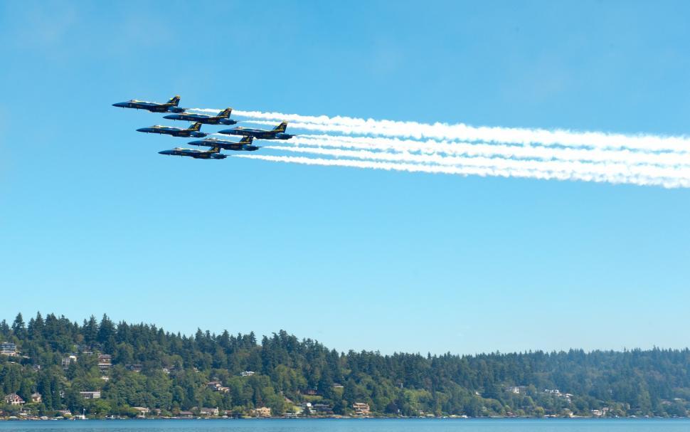 Free Image of Fighter Jets Flying Over a Lake 