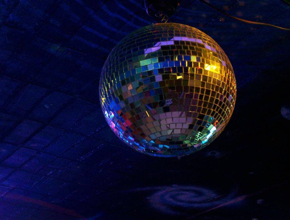 Free Image of Shiny Disco Ball Hanging From Ceiling 