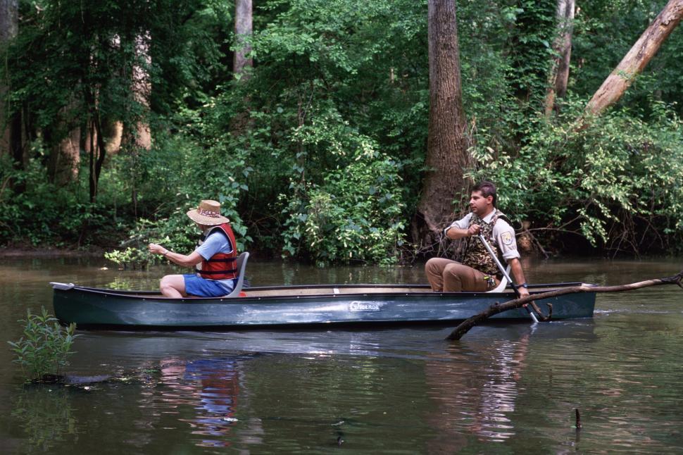 Free Image of Two People Boating on River 