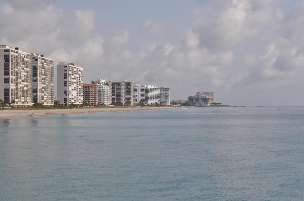 Free Image of Beach With Buildings in Background 