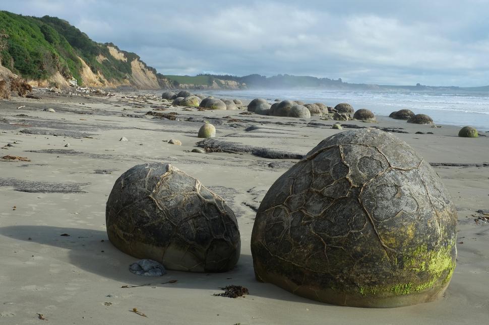 Free Image of Two Large Rocks on Sandy Beach 