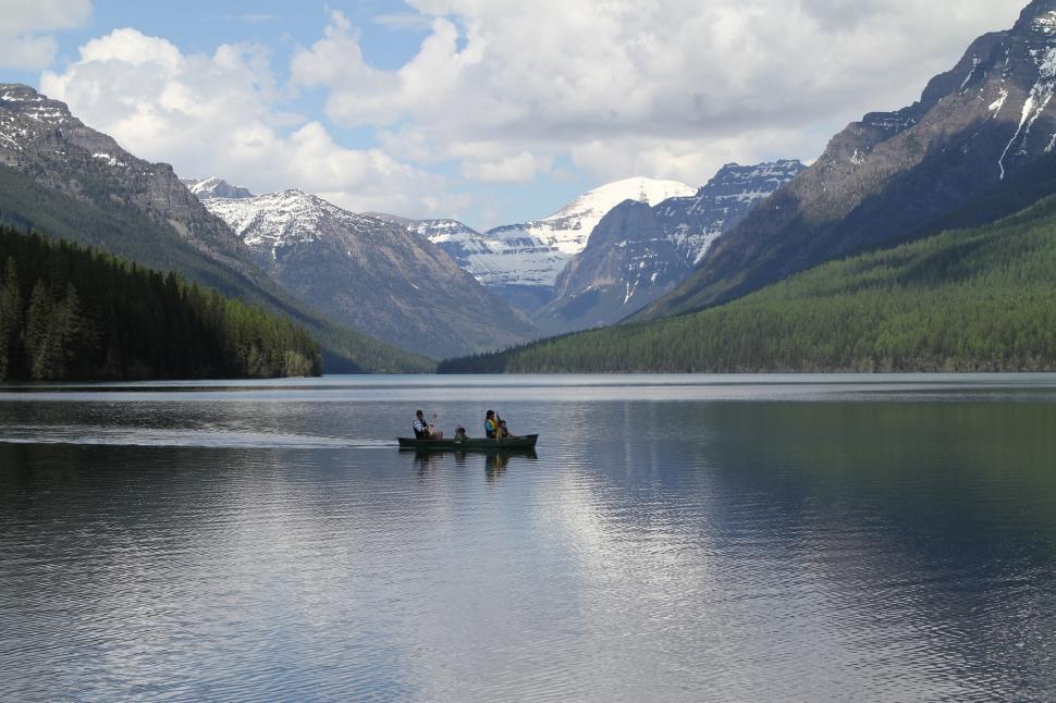 Free Image of Two People Boating on a Mountain Lake 