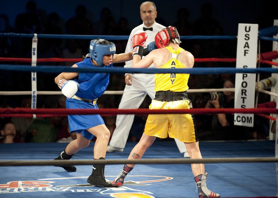 Free Image of Two Men Boxing in a Boxing Ring 