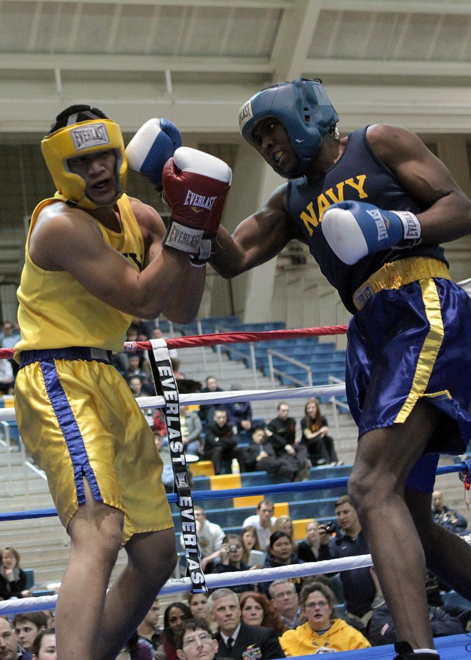 Free Image of Two Men Standing in Boxing Ring 