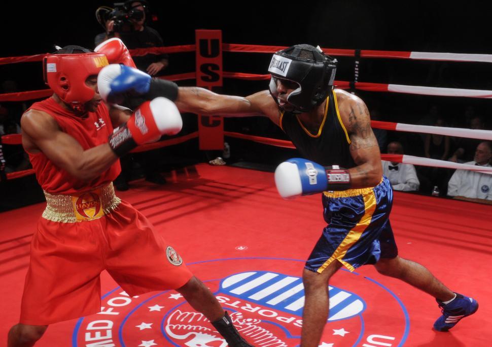 Free Image of Two Men Engaged in a Boxing Match 