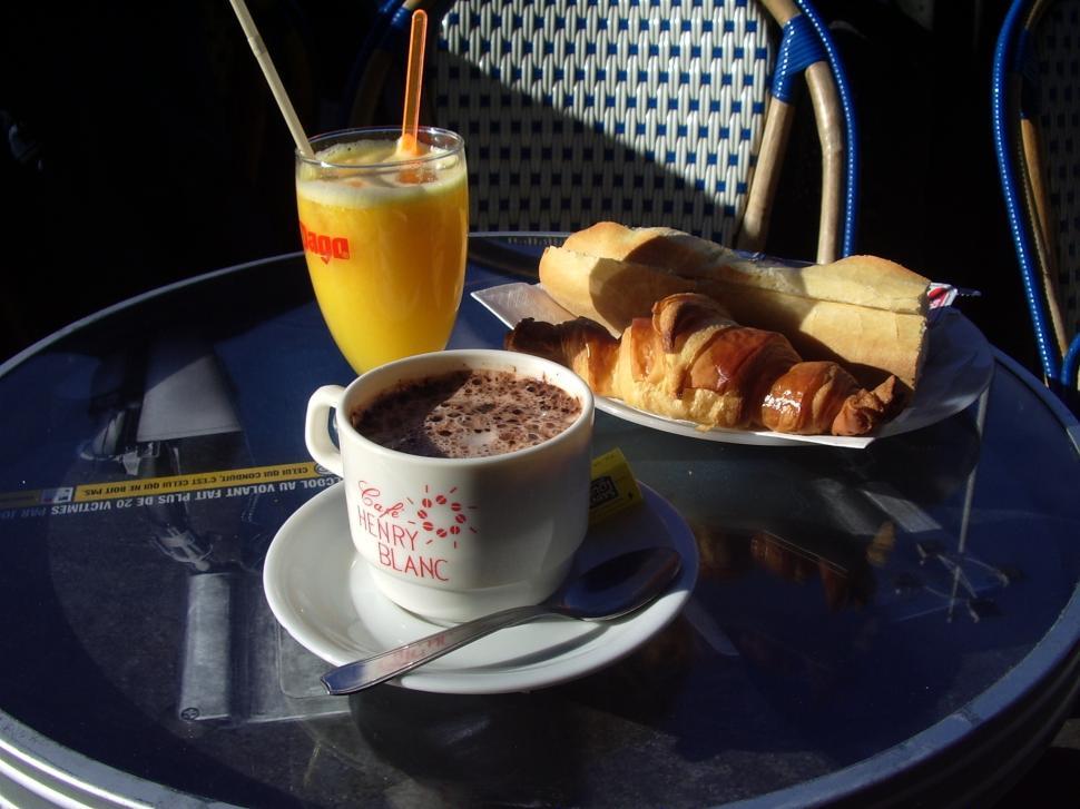 Free Image of Table With Coffee Cup and Croissants 