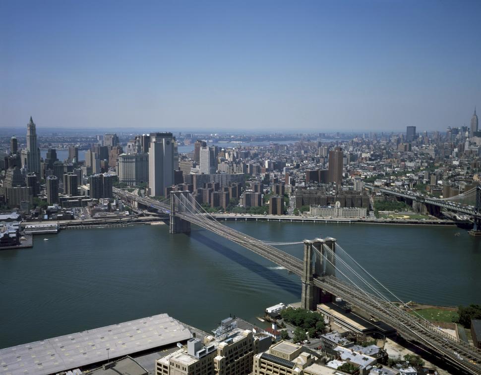 Free Image of Aerial View of a City and Bridge 