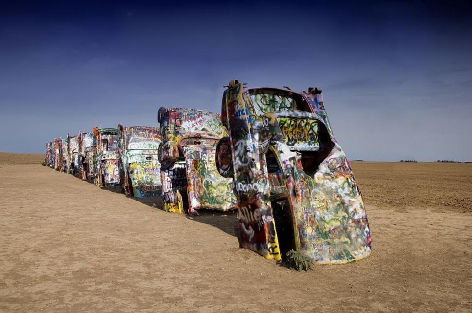 Free Image of Row of Abandoned Cars in Desert 