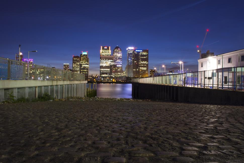 Free Image of Nighttime Cityscape Across River 