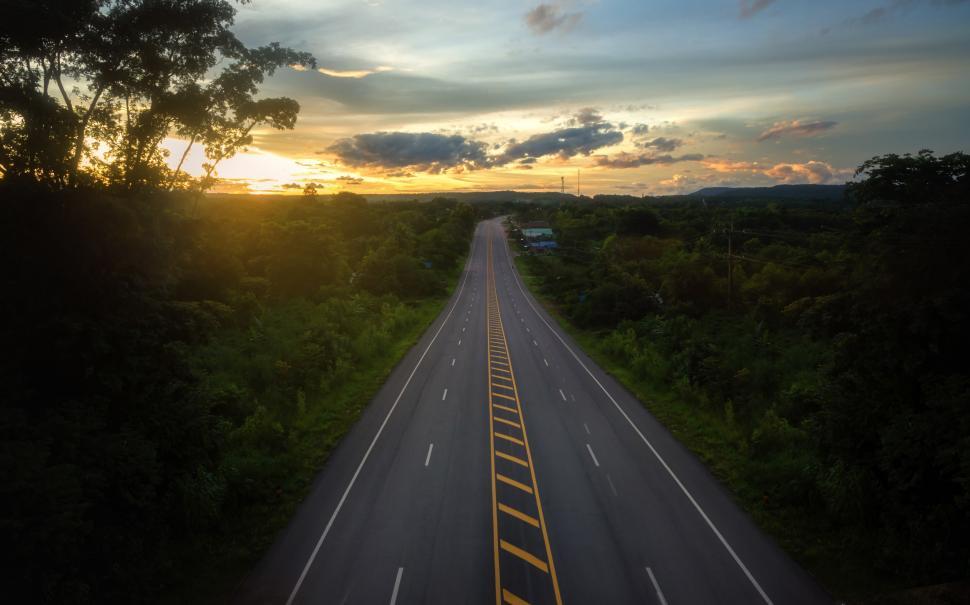 Free Image of Aerial View of Highway at Sunset 