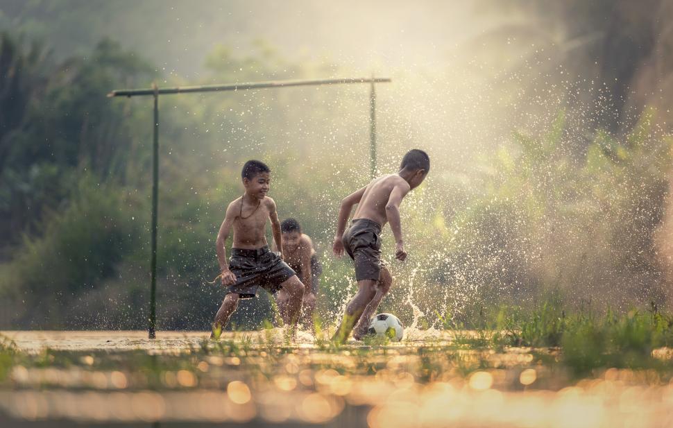Free Image of Young Men Playing Soccer 